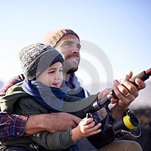 Watch this space...a loving father and son fishing by the sea.