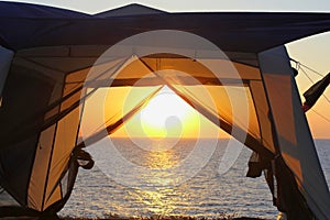 Watch the sunset from the tourist tents