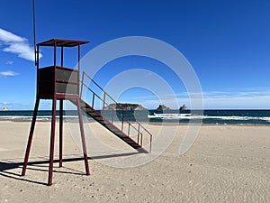 Watch tower on an empty beach of L`Estartit