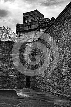 Watch tower of a penitentiary before a storm