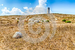 Watch tower on rocky beach