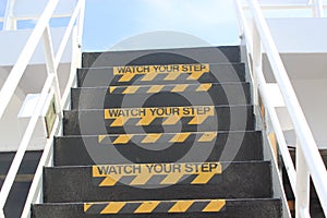 Watch your Step sign on outside stairs