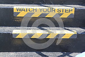 Watch your Step sign on stairs