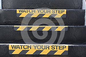 Watch your Step sign on stairs