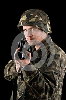 Watchful soldier with m16