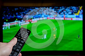 Watching Football on TV and using remote controller