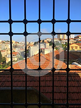 Watching out from window in Algiers