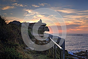 Watching sunrise at Coogee Beach Australia