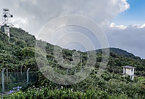 Watching tower and antenna at the military base with aerials located at the mountain