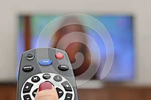 Watching TV and using remote controller