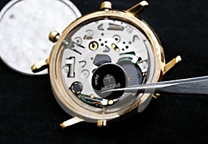 Watchmaker changing battery