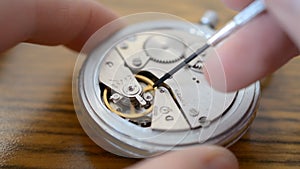 Watchmaker is repairing the mechanical watches