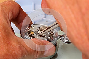 Watchmaker working on pocketwatch