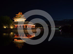 Watchtower of the forbidden city at night.