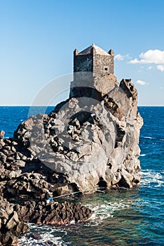 Watchtower on a lava cliff near Acireale