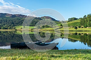 WATENDLATH, LAKE DISTRICT/ENGLAND - AUGUST 31 : Rowing boats moo