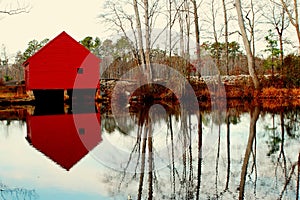 Water barn reflected on lake