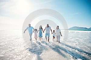 Water, beach and happy family walking at the sea or ocean bonding for love, care and happiness together. Happy, sun and