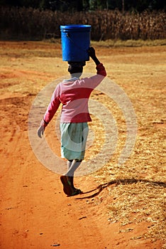 The water bearer - Pomerini - Tanzania - Africa