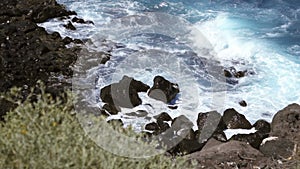 Water beating on the rocky shore