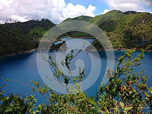 blue lake and green mountains in Montebello, Chiapas photo