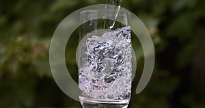 Water being poured into Glass,