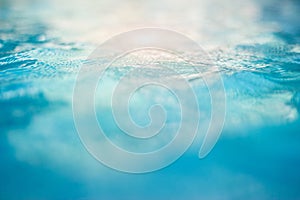 Water blue and white in swimming pool background