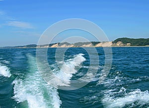 Water boat wake on Michigan lake