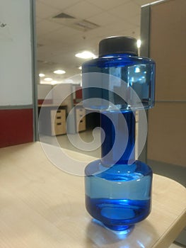 Dumbell water bottle in work place photo
