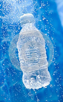 A Water bottle in a water splash