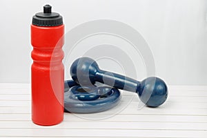 Water bottle, weight and dumbbell