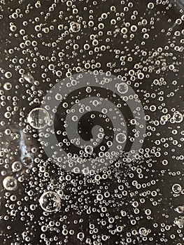 Water bubbles on black background.