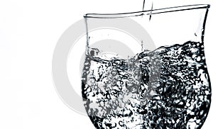 Water bubbles in a glass isolated