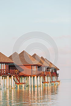 Water bungalows with turquiose water on Maldives