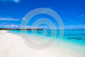 Water bungalows and wooden jetty on Maldives