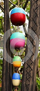 Water buoys strung on rope photo