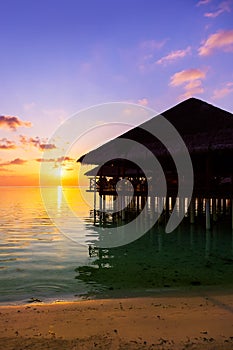 Water cafe at sunset - Maldives