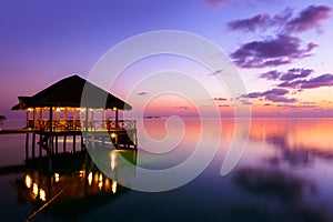 Water cafe at sunset - Maldives