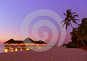 Water cafe at sunset - Maldives