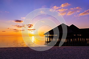 Water cafe at sunset - Maldives