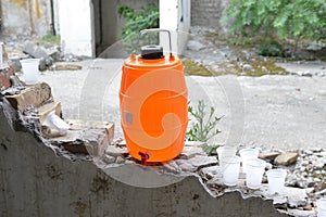 Water canister in ruins- water shortage
