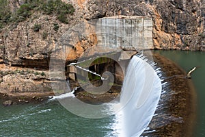 Water cascade in dam with concrete installations