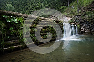 Water cascade by historic watermill Oblazy, Kvacianska dolina, Slovakia