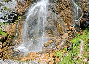 Water cascade with rainbow, Dalfazer Wasserfall, near Achensee
