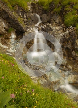 Water cascade in a small rocky gorge