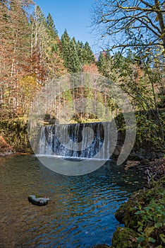 Water cascade at sollbach river in autumn