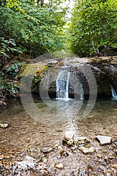 Water cascade on Ulu-Uzen river in Haphal Gorge