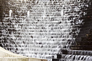 Water cascading down steps - feathery