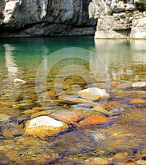 Water cascading over rocks in a creek near Arsiero, Italy