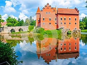 Water castle Cervena Lhota reflected in the water. Southern Bohemia, Czech Republic